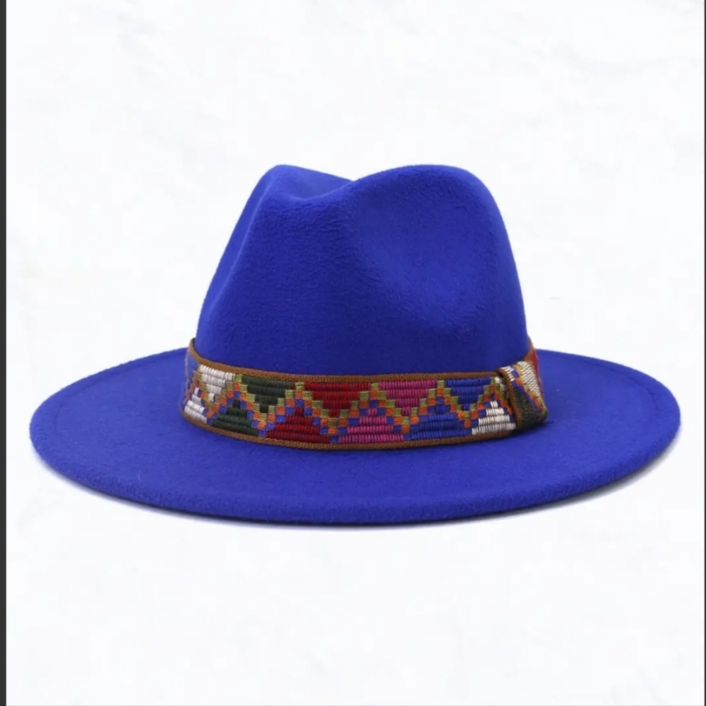 Brand new never worn. Blue Fedora with multi colored band.